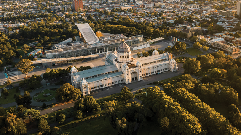 An ariel shot of the Royal Exhibition Building, Melbourne Museum and surrounding gardens.